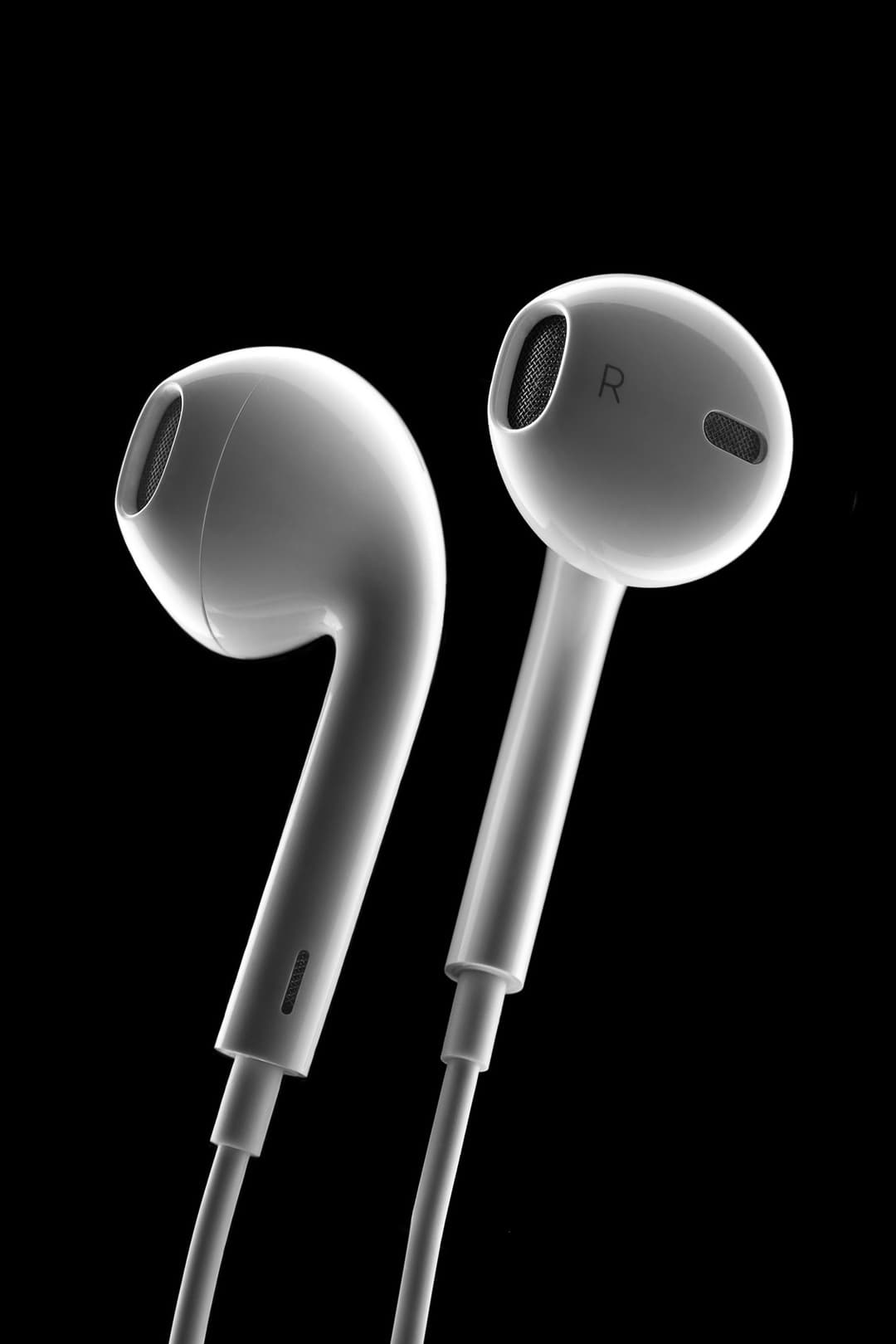 A pair of white headphones